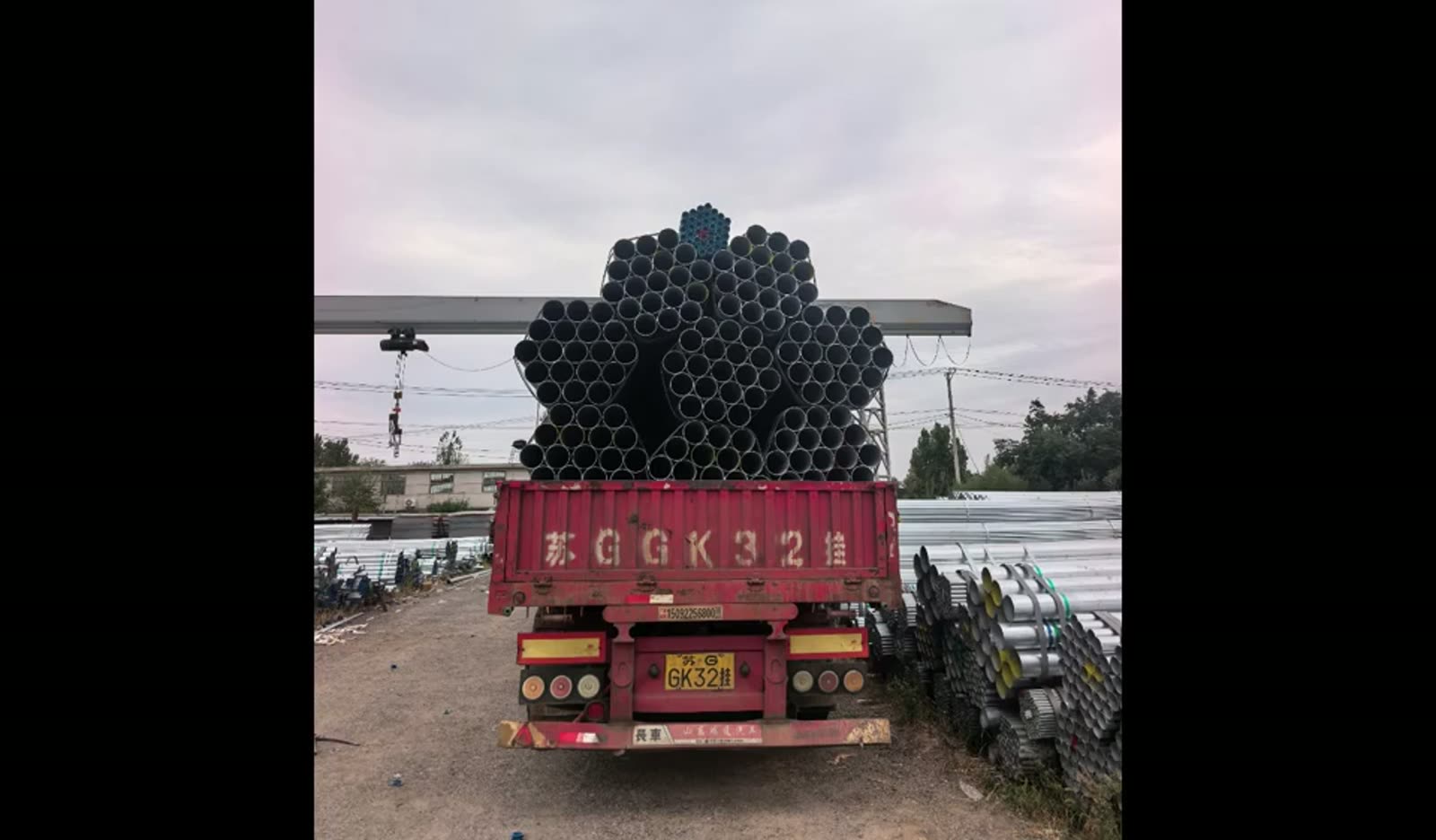 Galvanized pipe bundles loaded on a truck