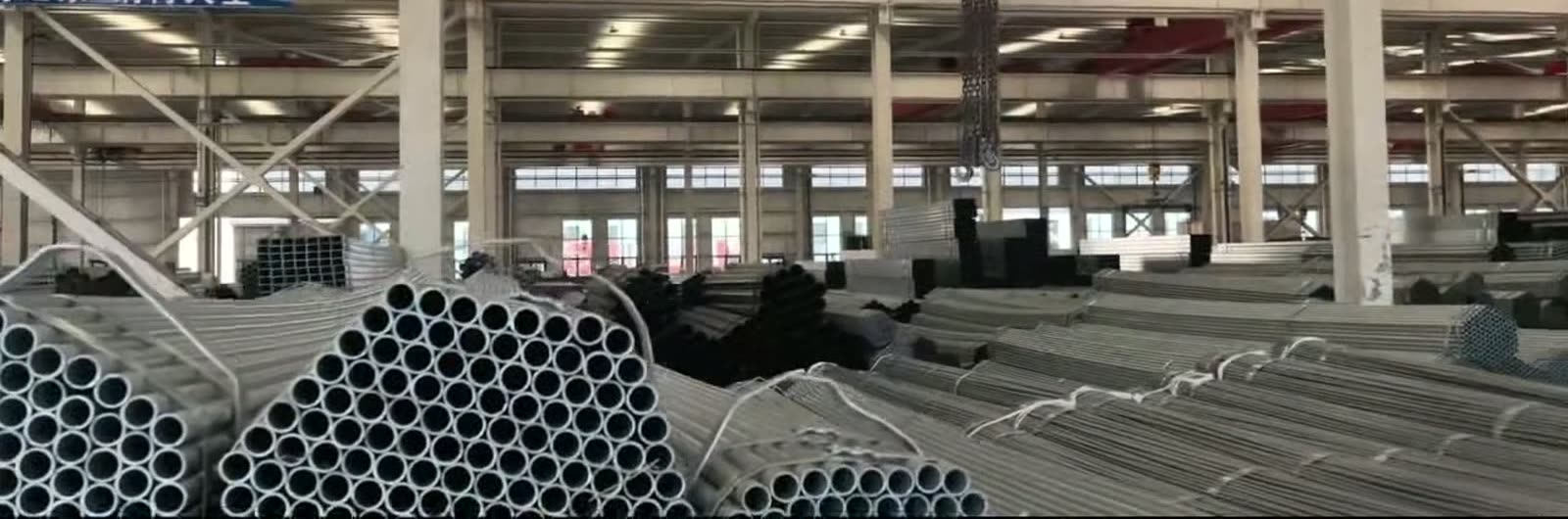Galvanized pipe bundles inside a warehouse
